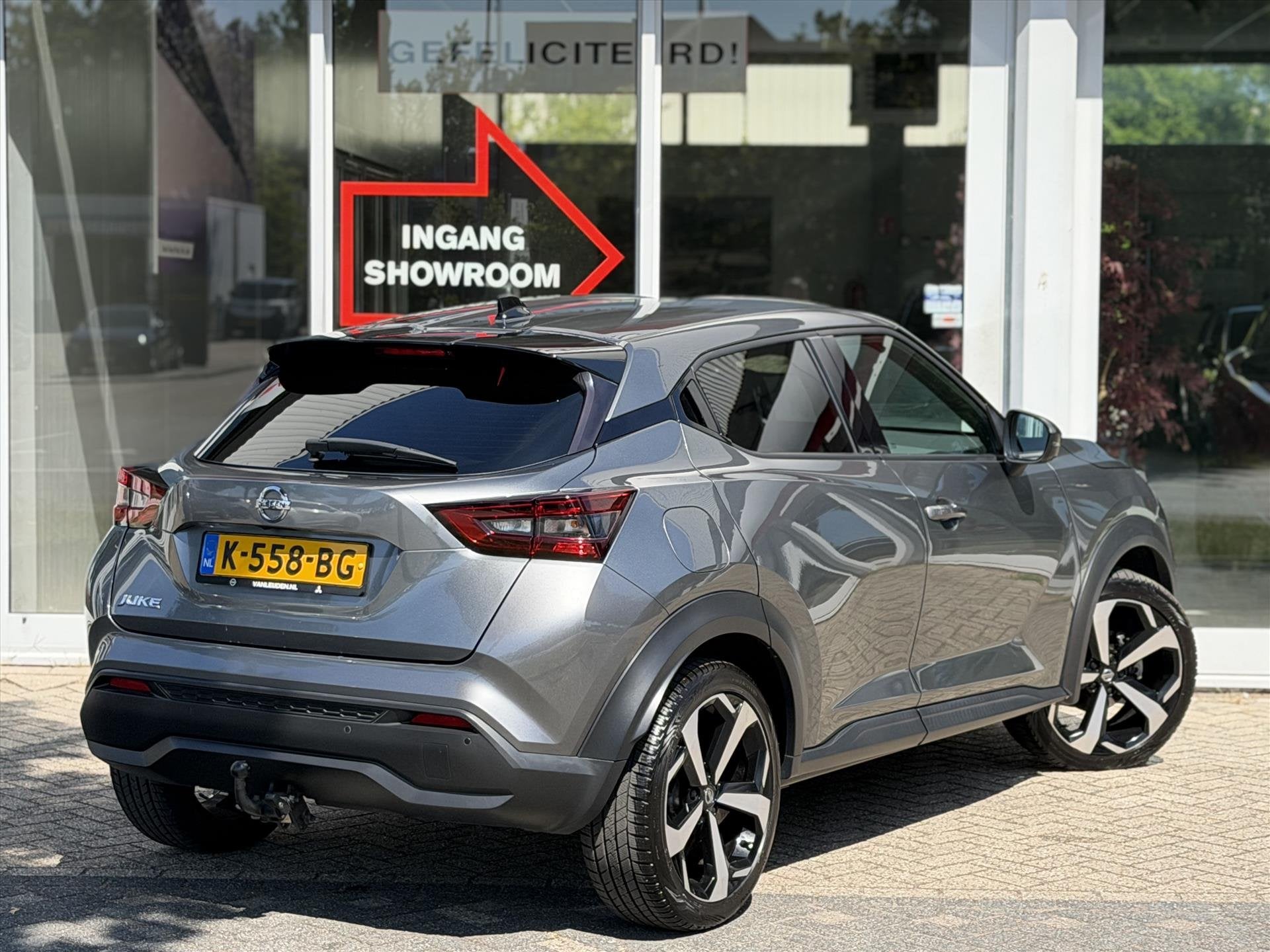 Nissan Juke 1.0 DIG-T DCT Tekna | Trekhaak | BOSE | Navigati, Leder en Stof, Bedrijf, 3 cilinders, 638 kg
