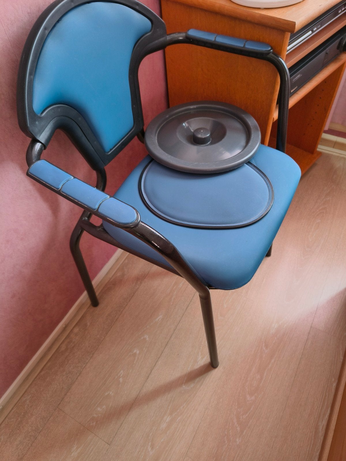 Po stoel douchestoel, Ophalen