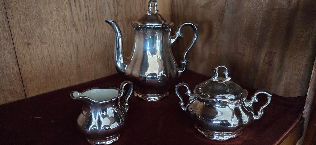 Antiek verzilverd porselein koffie- of theeservies, Antiek en Kunst, Ophalen