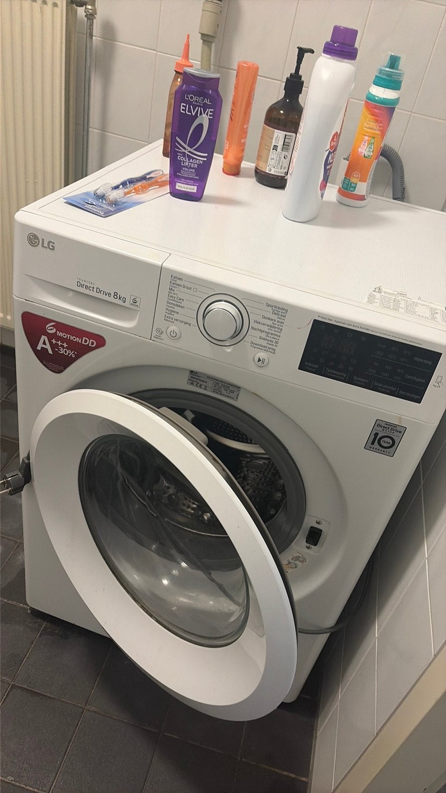 LG wasmachine, Ophalen of Verzenden, Zo goed als nieuw, 1200 tot 1600 toeren, 85 tot 90 cm