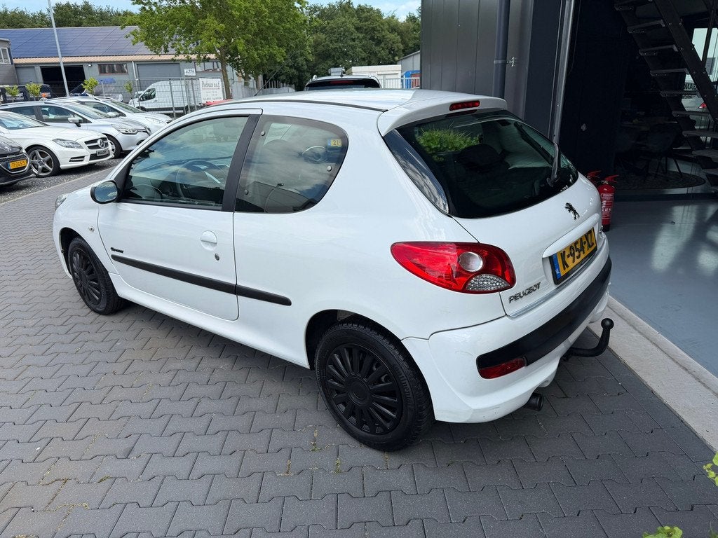 Peugeot 206 + 1.4 Millesim 200, Auto's, Voorwielaandrijving, Stof, 4 cilinders, Wit