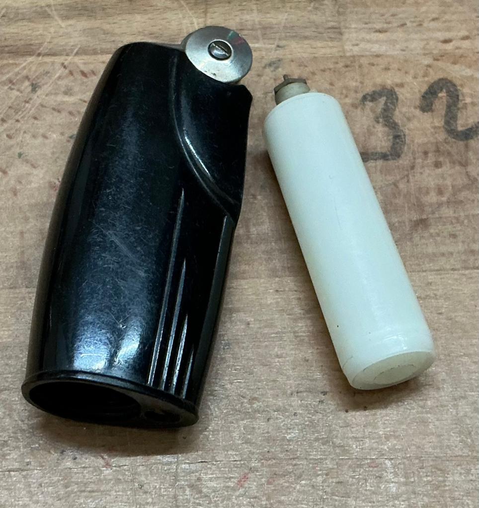 Oude poppell aansteker, Verzamelen, Rookartikelen, Aanstekers en Luciferdoosjes, Ophalen of Verzenden, Gebruikt, Aansteker