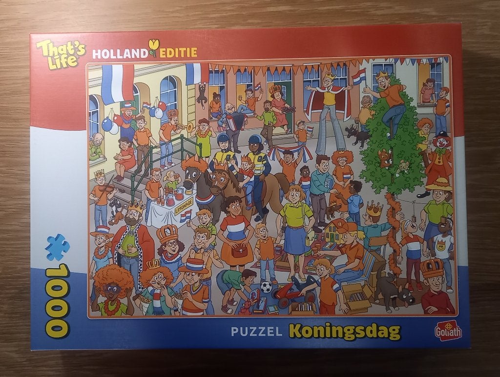 That's life puzzel Holland editie Koningsdag1000 stukjes, Ophalen of Verzenden, 500 t/m 1500 stukjes, Zo goed als nieuw, Legpuzzel