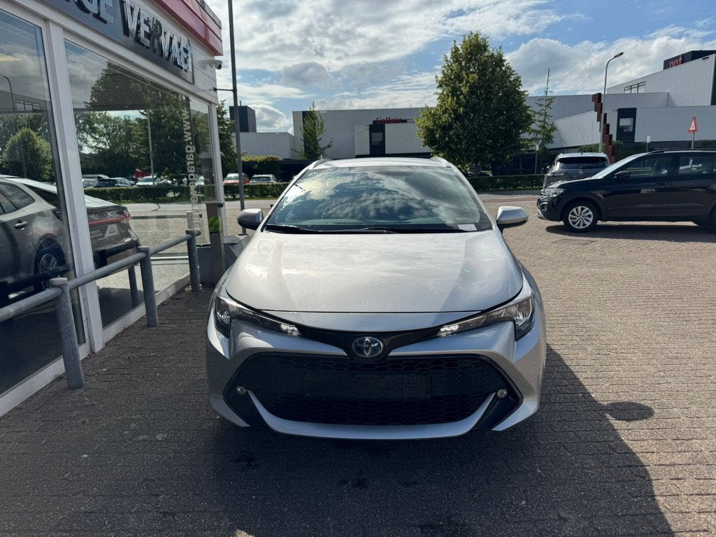 Toyota Corolla Touring Sports 1.8 Hybrid Dynamic (bj 2020), 1345 kg, Stof, Gebruikt, Zwart