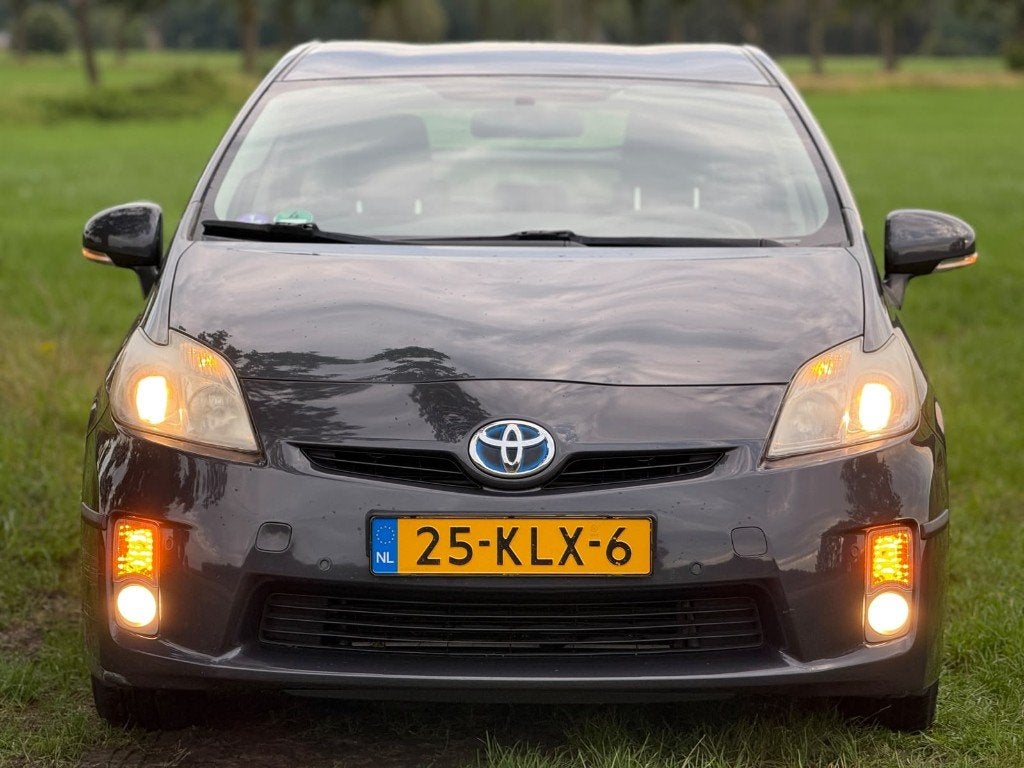 Toyota Prius 1.8 Full Hybrid 136PK Aut 2010 Grijs, Auto's, 4 cilinders, Origineel Nederlands, 26 km/l, Adaptive Cruise Control