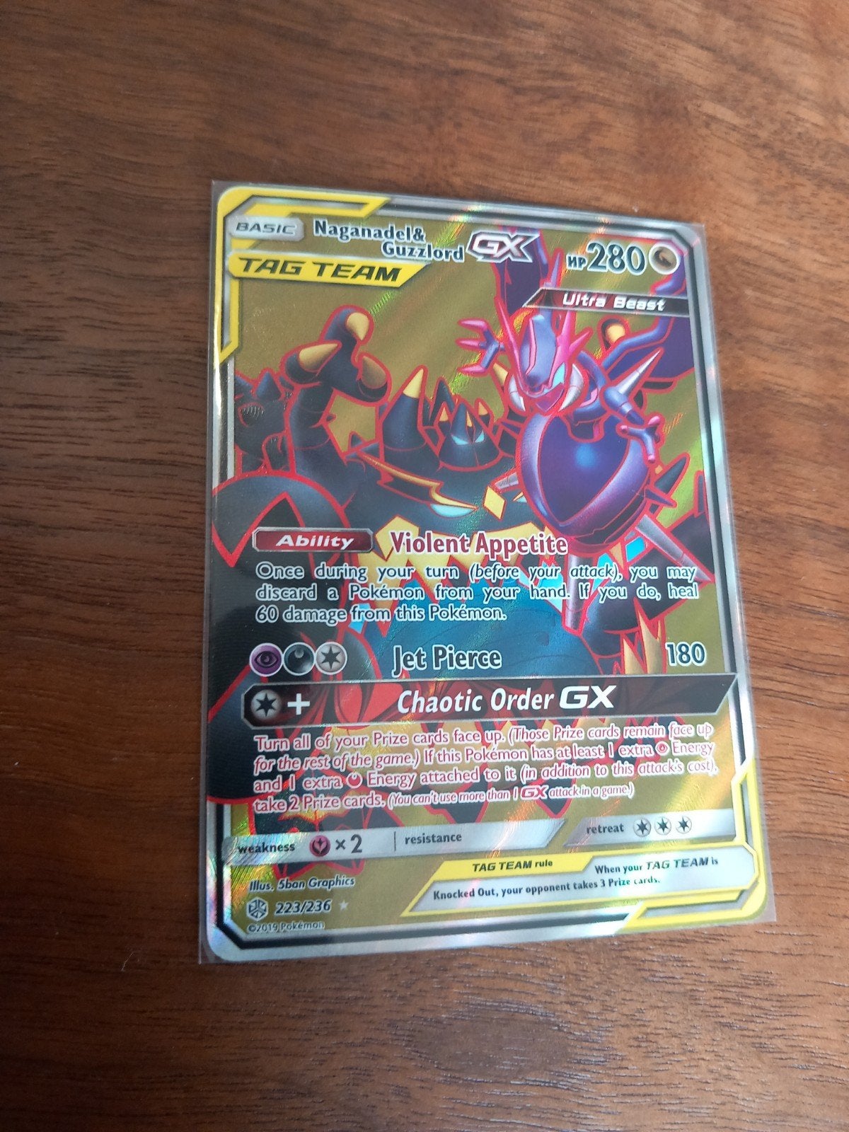 Naganadel & Guzzlord GX TAG TEAM Pokémon kaart, Ophalen of Verzenden, Zo goed als nieuw, Losse kaart, Foil