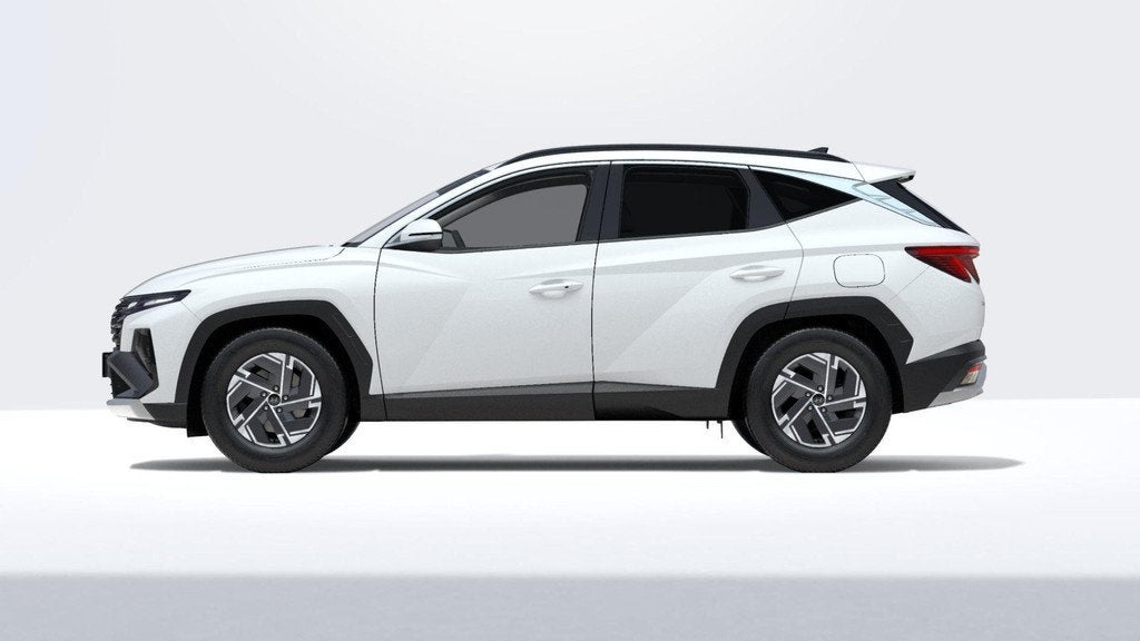 Hyundai Tucson 1.6 T-GDI HEV Comfort Smart | HOGE KORTING! |, Auto's, 12 maanden, 4 cilinders, Leder en Stof, Zwart