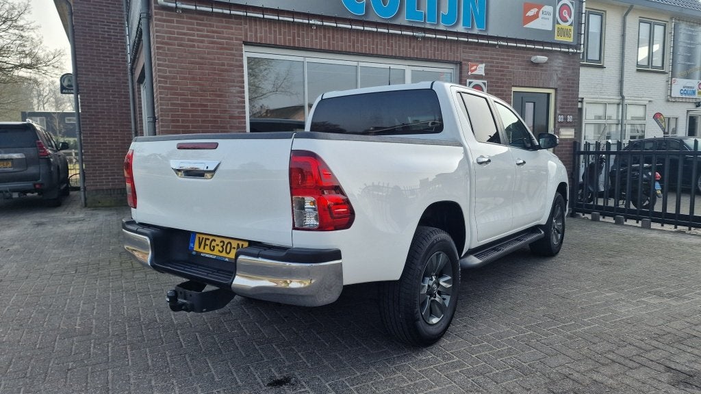 Toyota Hilux 2.4 D-4D-F DC 4WD Professional, Unieke staat!, Stof, Gebruikt, 4 cilinders, 150 pk