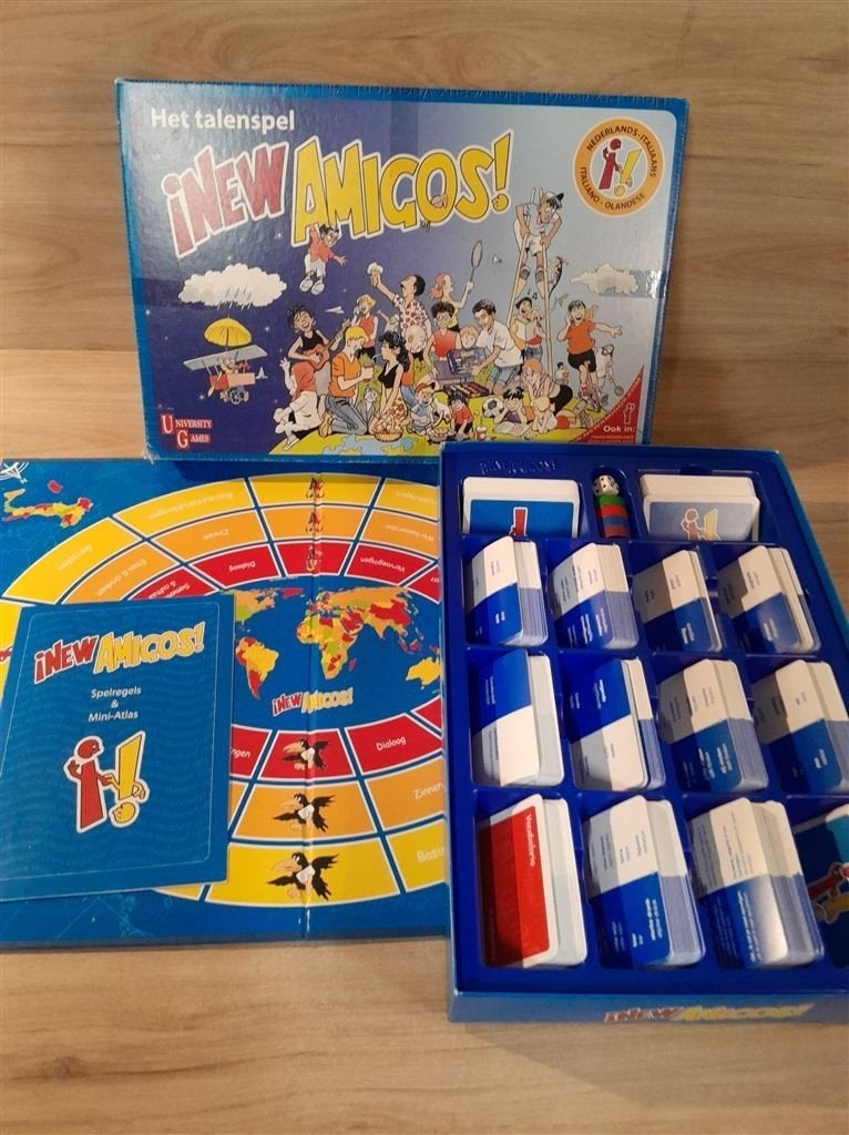 New Amigos - Het talenspel - Italiaans - Nederlands - s5874, Hobby en Vrije tijd, Gezelschapsspellen | Bordspellen, Verzenden
