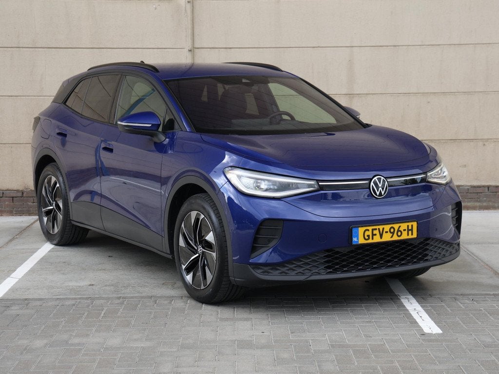Volkswagen ID.4 Pro Business 77 kWh 286 pk | Navigatie | Cam, Auto's, Volkswagen, Automaat, Achterwielaandrijving, Gebruikt, Blauw