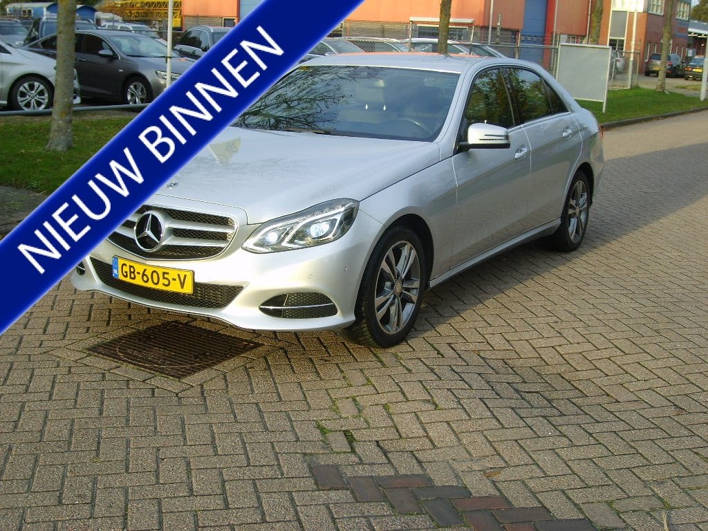 Mercedes-Benz E-Klasse 200 Ambition Avantgarde (bj 2015), Auto's, Achterwielaandrijving, Gebruikt, 4 cilinders, Leder en Stof