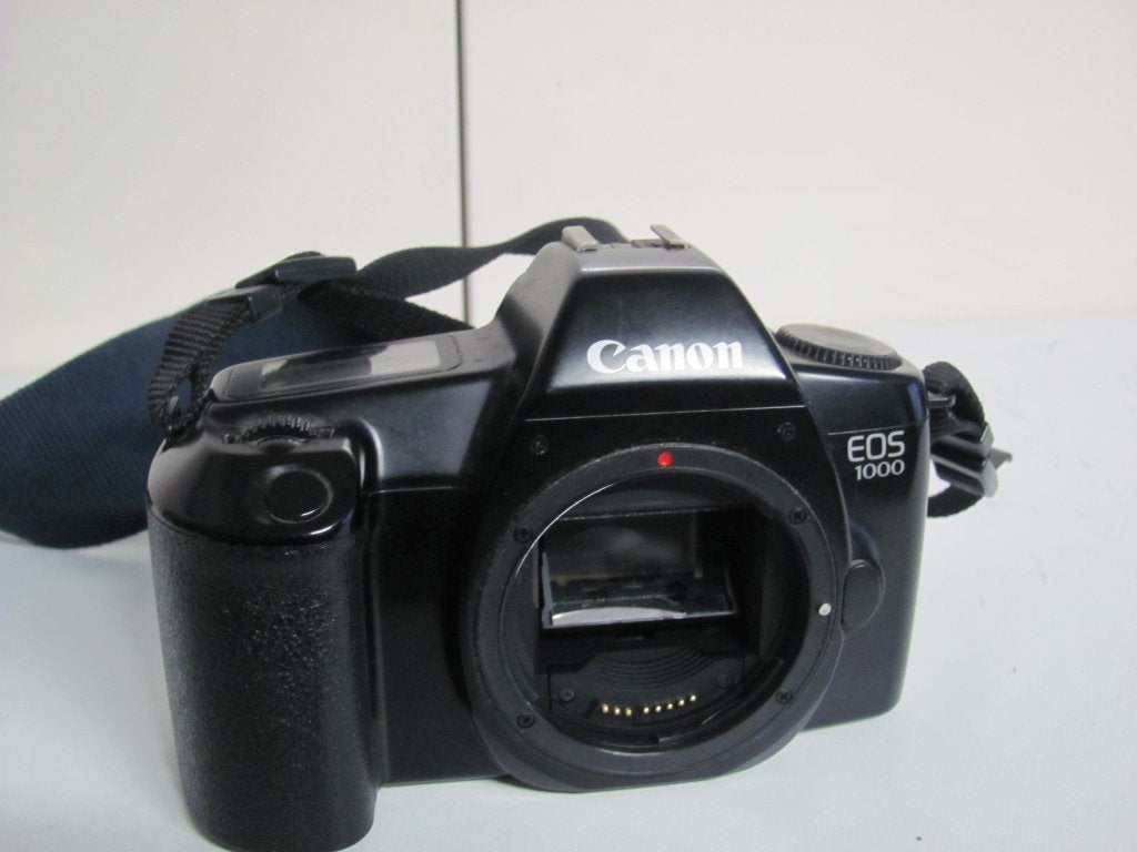 analoge spiegelreflexcamera van canon eos 1000, Audio, Tv en Foto, Fotocamera's Analoog, Ophalen of Verzenden, Zo goed als nieuw