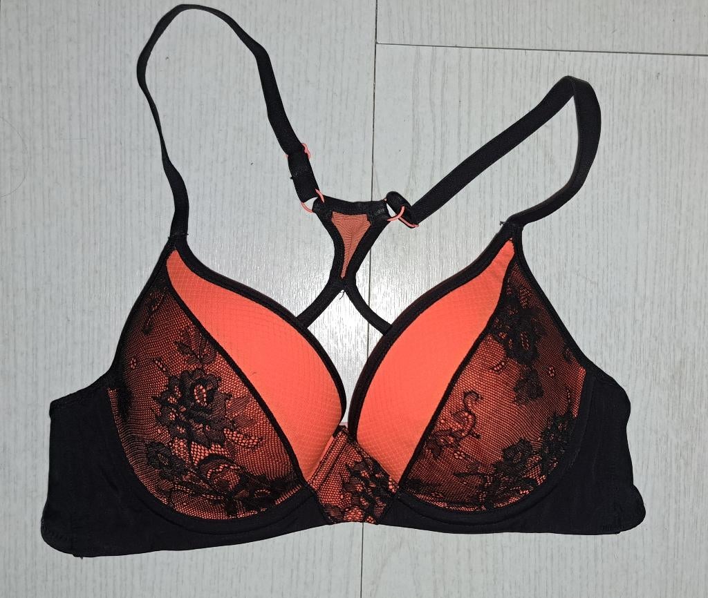 Sport beha / bh neon oranje Hunkemöller (nieuw!), Maat 38/40 (M), Verzenden, Zwart, Nieuw
