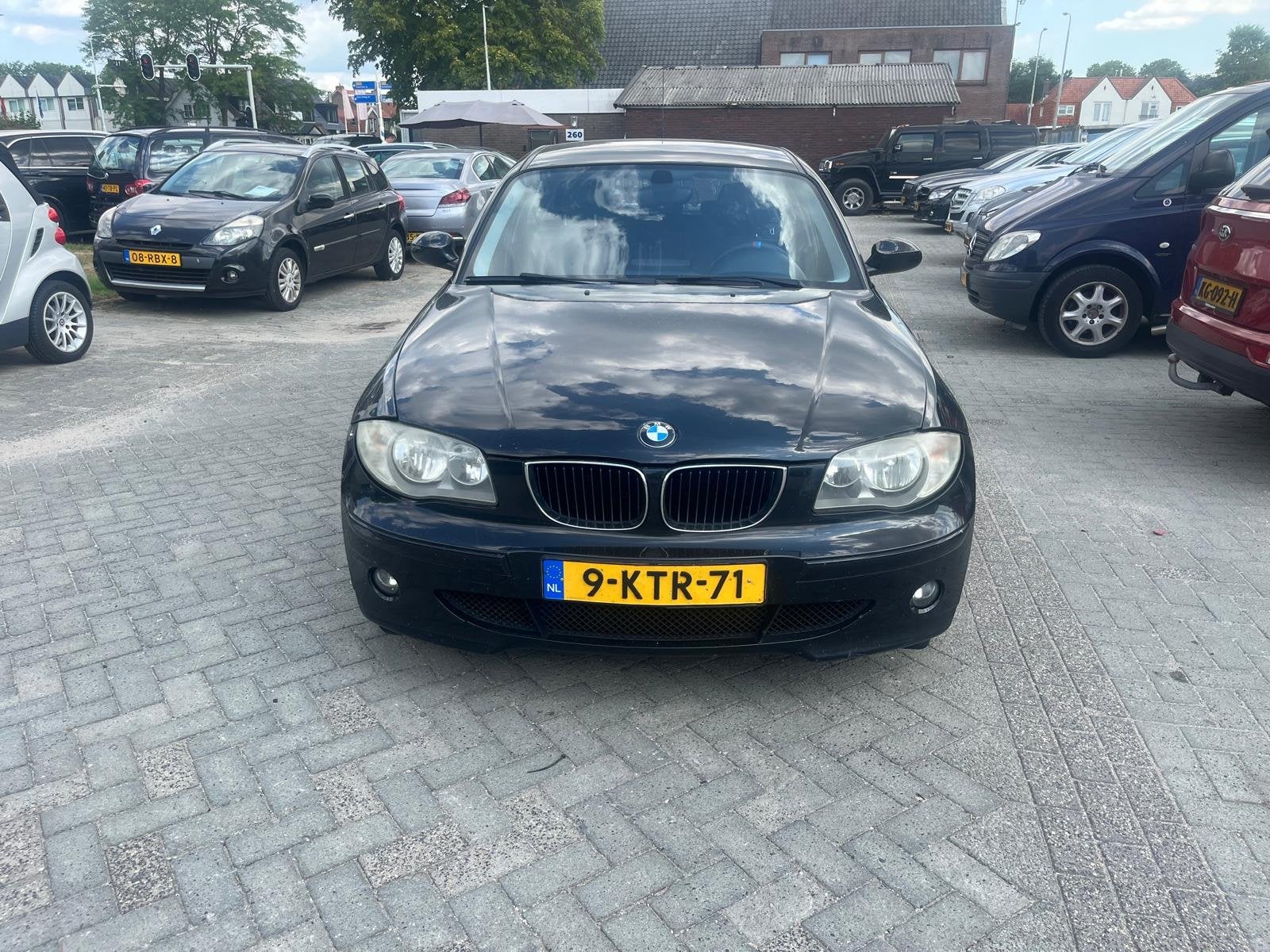 BMW 1-serie 116i Executive airco lm velgen elec ramen naviga, Auto's, BMW, Gebruikt, Zwart, 4 cilinders, 635 kg