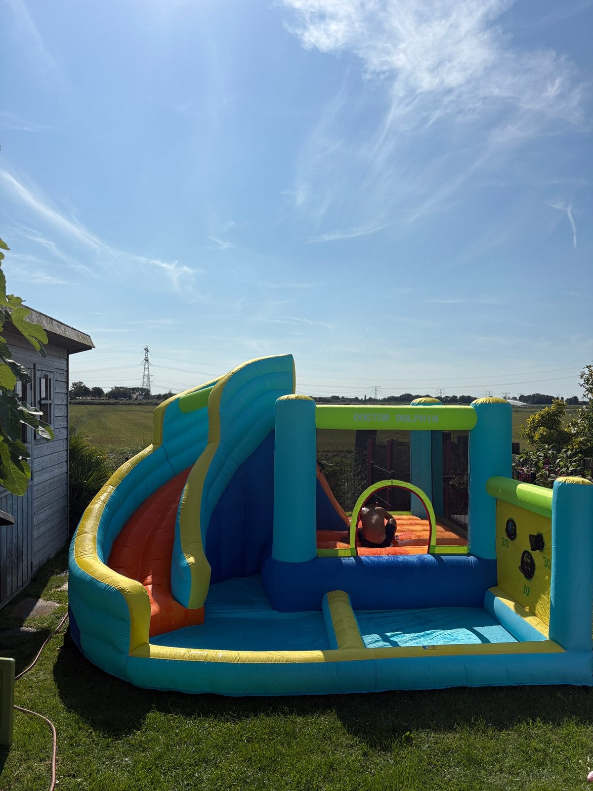 Te huur Opblaasbaar springkasteel met glijbaan en zwembad, Ophalen, Zo goed als nieuw