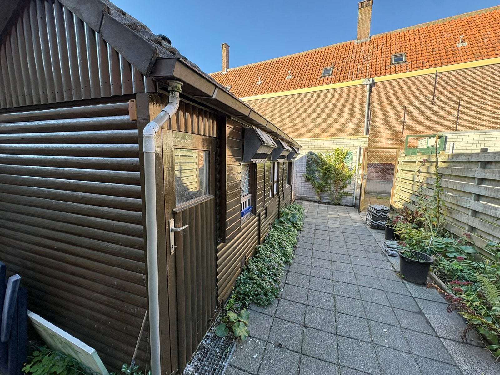 Hulp bij afbreken en opbouwen duivenhok