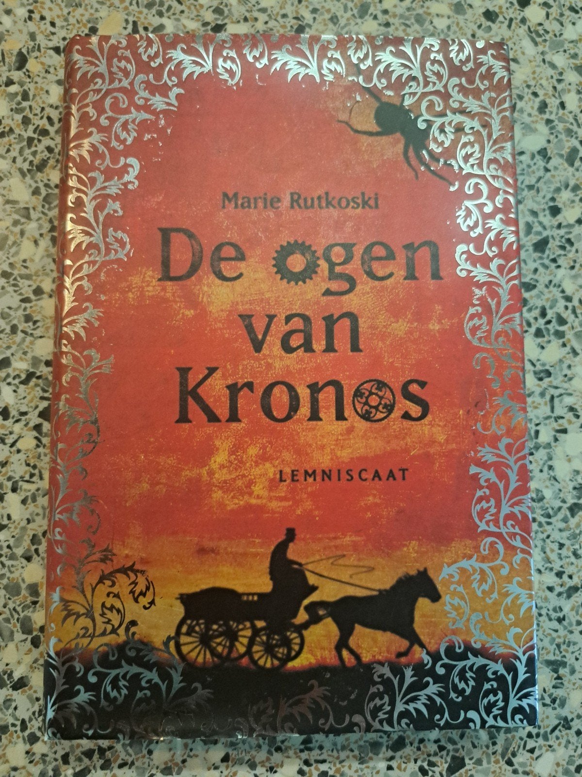 M. Rutkoski - De ogen van Kronos, Ophalen of Verzenden, Zo goed als nieuw, M. Rutkoski