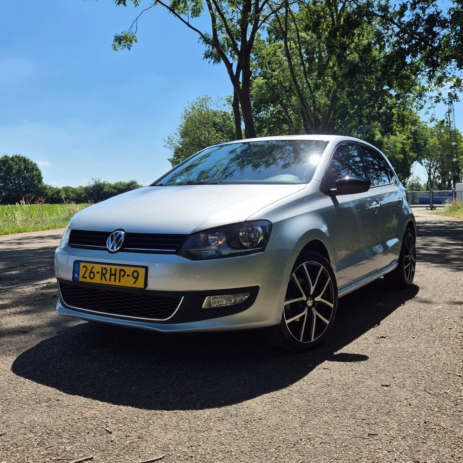 Volkswagen Polo 1.2 TSI Highline 2011 Grijs (Incl winterset), Auto's, Voorwielaandrijving, Stof, 40 €/maand, Zwart