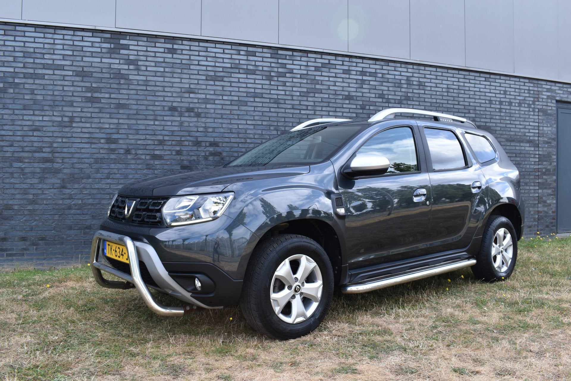 Dacia Duster 1.2 TCe Comfort Airco sidestep (bj 2018), Auto's, Dacia, Voorwielaandrijving, Stof, Gebruikt, Euro 6