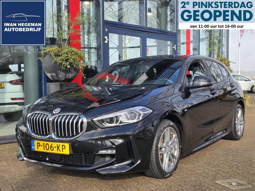 BMW 1-serie 120i M-Sport | Navigatie | Sportstoelen | Cruise, Auto's, BMW, Gebruikt, 4 cilinders, Zwart, 178 pk