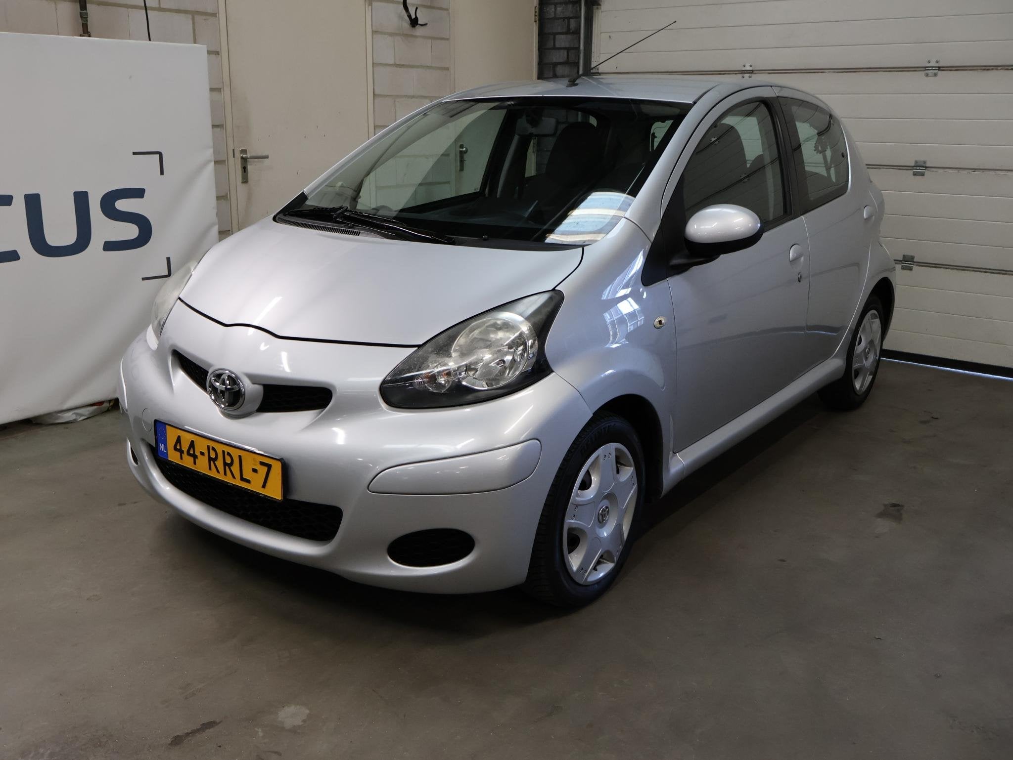 Toyota Aygo 1.0-12V Comfort Navigator NAP Airco Navi 12-26 A, Voorwielaandrijving, Euro 5, Gebruikt, 4 stoelen