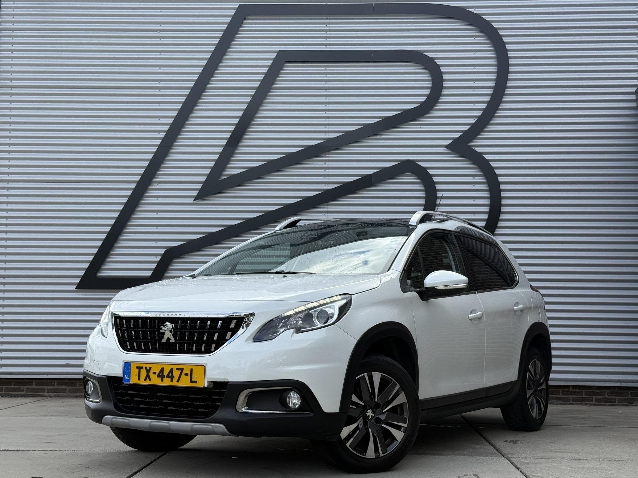 Peugeot 2008 1.2 PureTech Allure 2e Eigenaar|Navi|Pano|Carpl, Auto's, Stof, Euro 6, 1199 cc, 610 kg