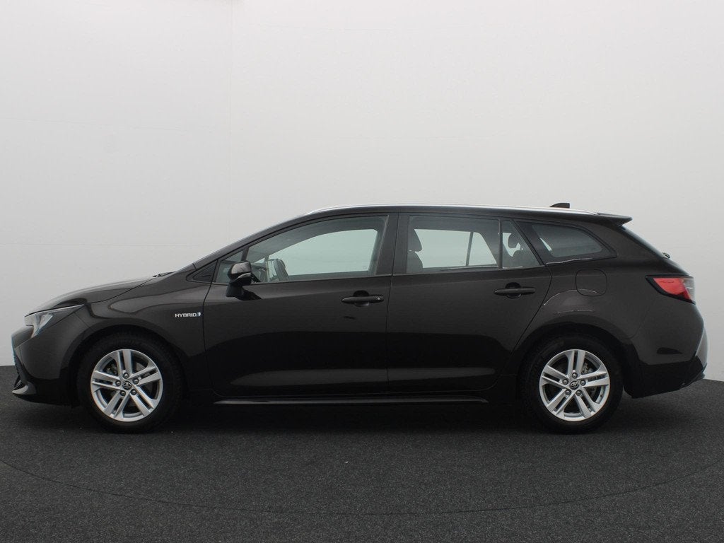 Toyota Corolla Touring Sports 1.8 Hybrid Business CAMERA / F, Auto's, Gebruikt, 4 cilinders, Bruin, Corolla