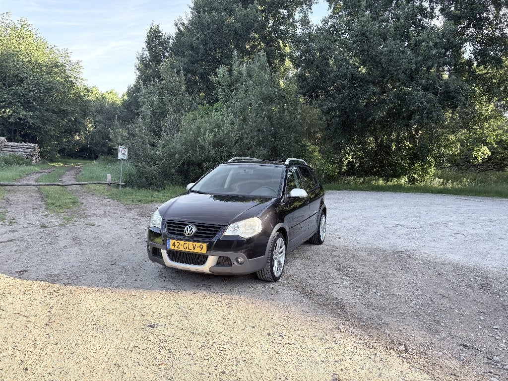 Volkswagen Polo 1.6 77KW Cross AUT 2008 Zwart, Stof, 1112 kg, 4 cilinders, Zwart