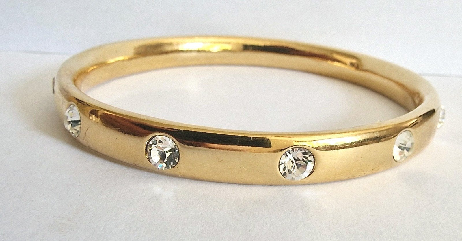 Vergulde Monet armband., Ophalen of Verzenden