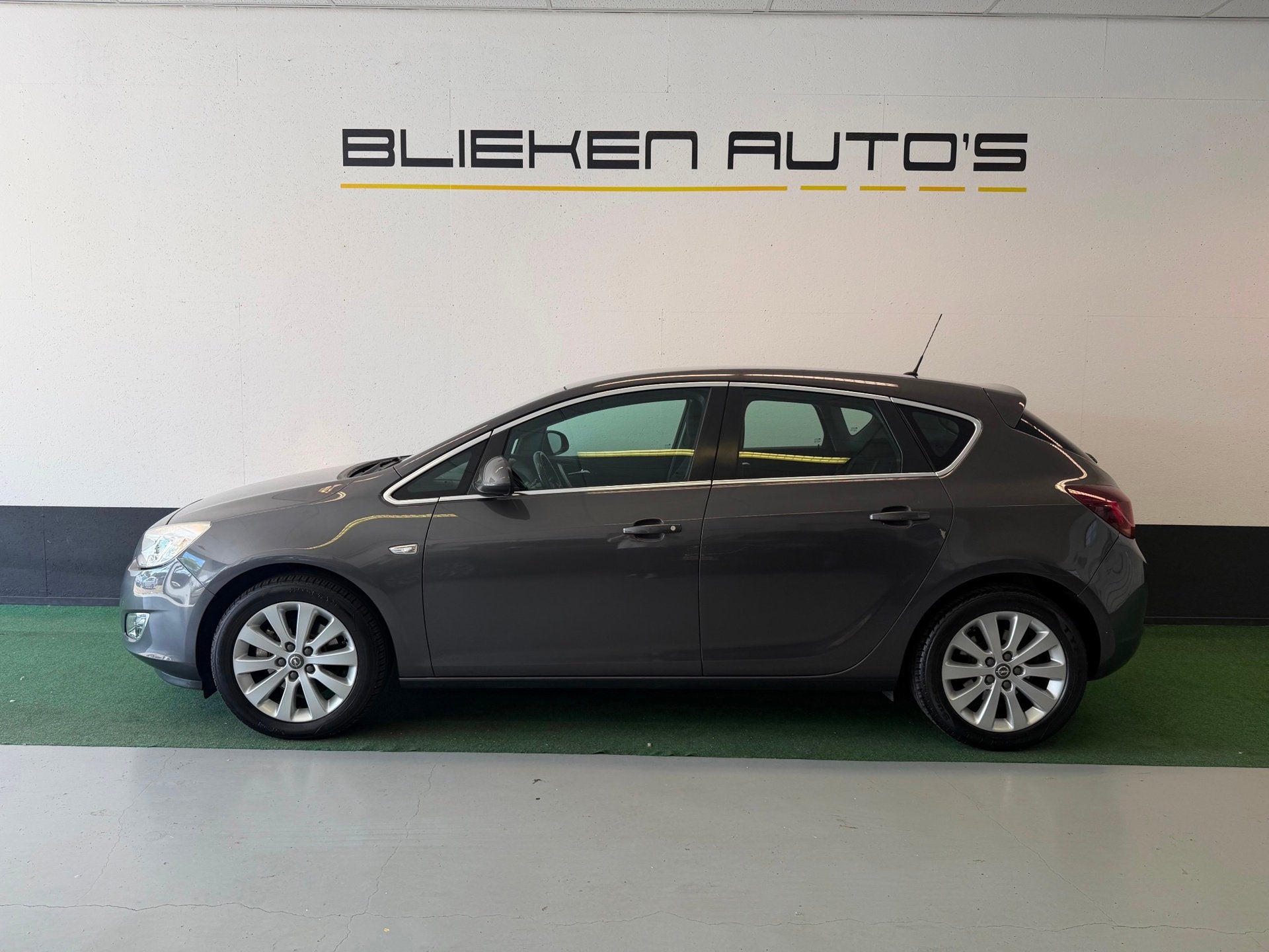 Opel Astra 1.6 Turbo Cosmo *zie tekst*, Auto's, Euro 5, 730 kg, Gebruikt, 4 cilinders