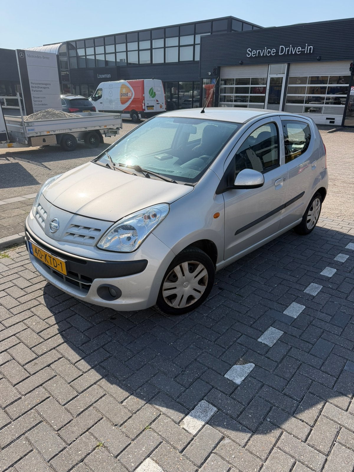 Nissan Pixo 1.0 50KW 5D 2010 Grijs, Auto's, Voorwielaandrijving, 200 kg, 4 stoelen, Origineel Nederlands