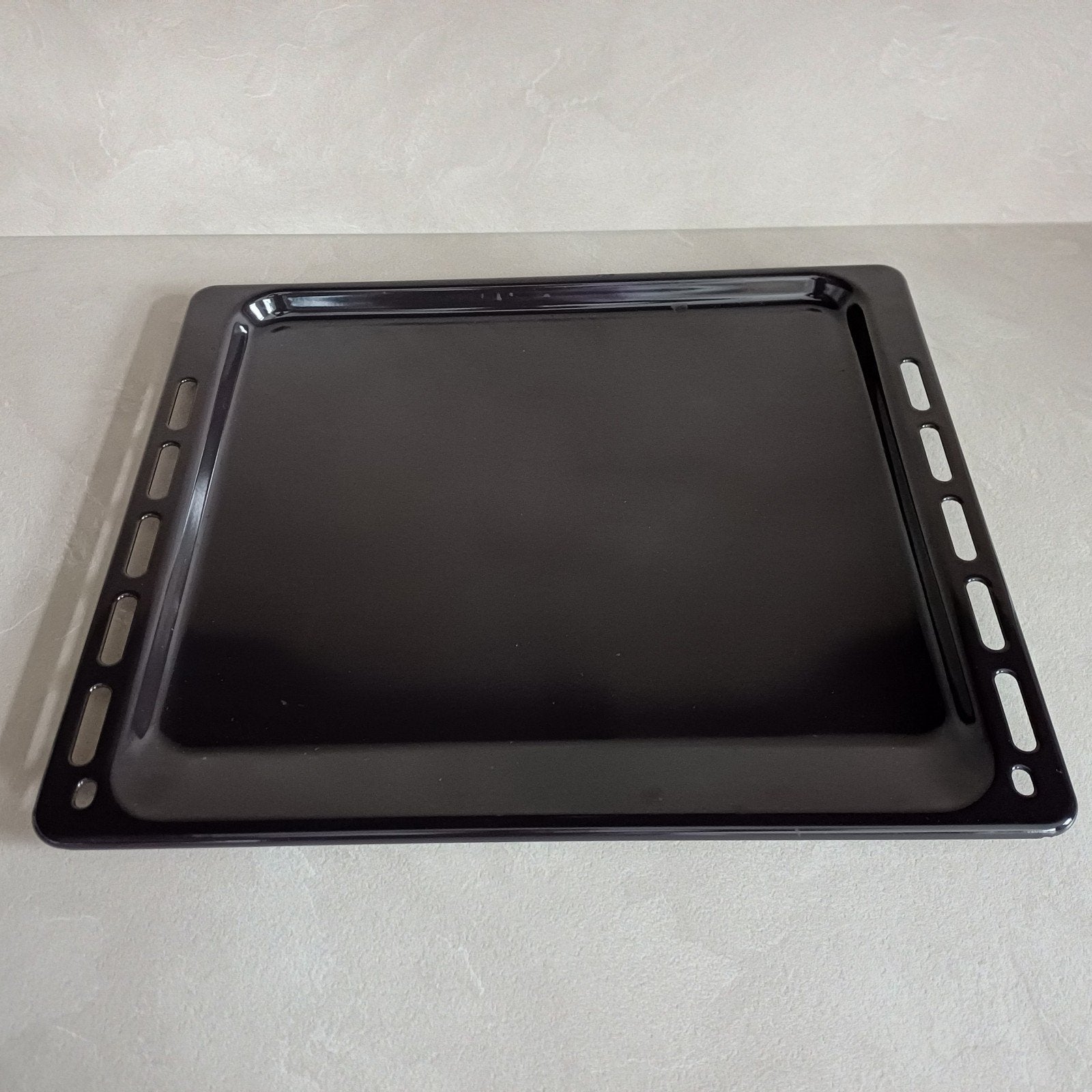 Te koop: Ovenbakplaat met stoomopeningen, Ophalen, Overige typen, Zo goed als nieuw, Zwart