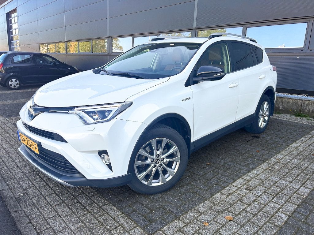 Toyota Rav4, Hybride 155pk AWD Aut 2017, wit parelmoer, Auto's, Automaat, Dealer onderhouden, 1650 kg, Wit