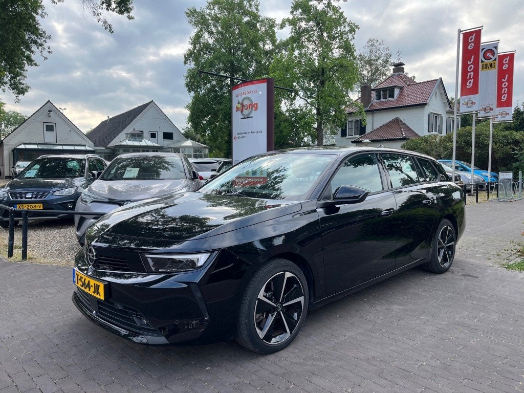 Opel ASTRA SPORTS TOURER 1.6 HYBRID LEVEL 2 PHEV PLUG-IN / T, Auto's, Automaat, Gebruikt, Euro 6, 4 cilinders