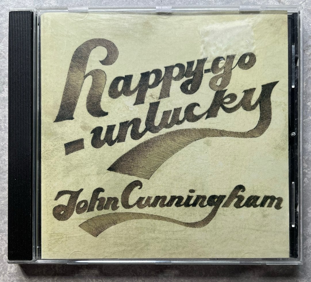 John Cunningham - Happy-go-unlucky (CD Indie Rock), Cd's en Dvd's, Ophalen of Verzenden, Zo goed als nieuw, Indie Rock, Inclusief doosje