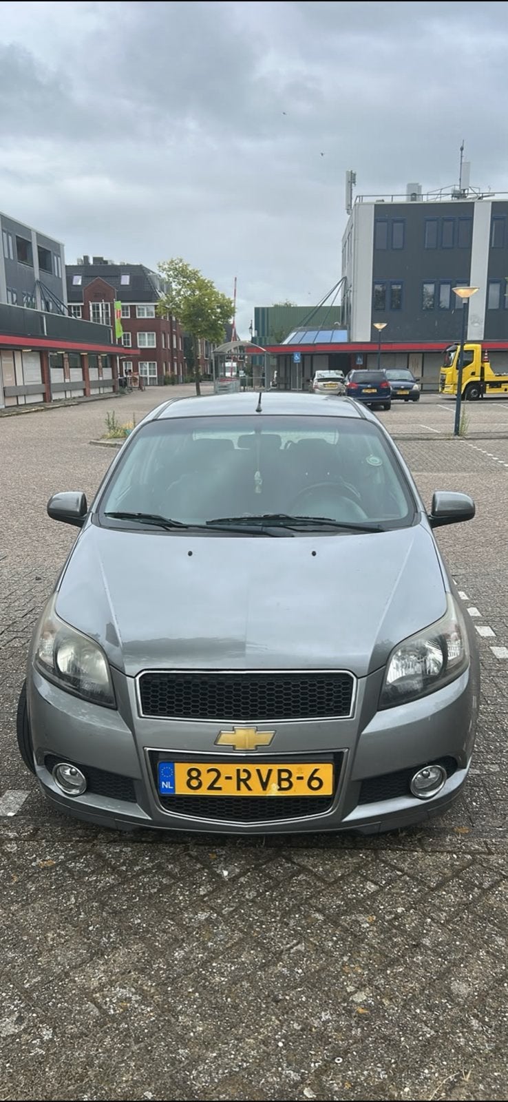 Chevrolet Aveo 1.2 16V 5D 62KW 2011 Grijs, Auto's, Chevrolet, Voorwielaandrijving, 40 €/maand, Aveo, 4 cilinders