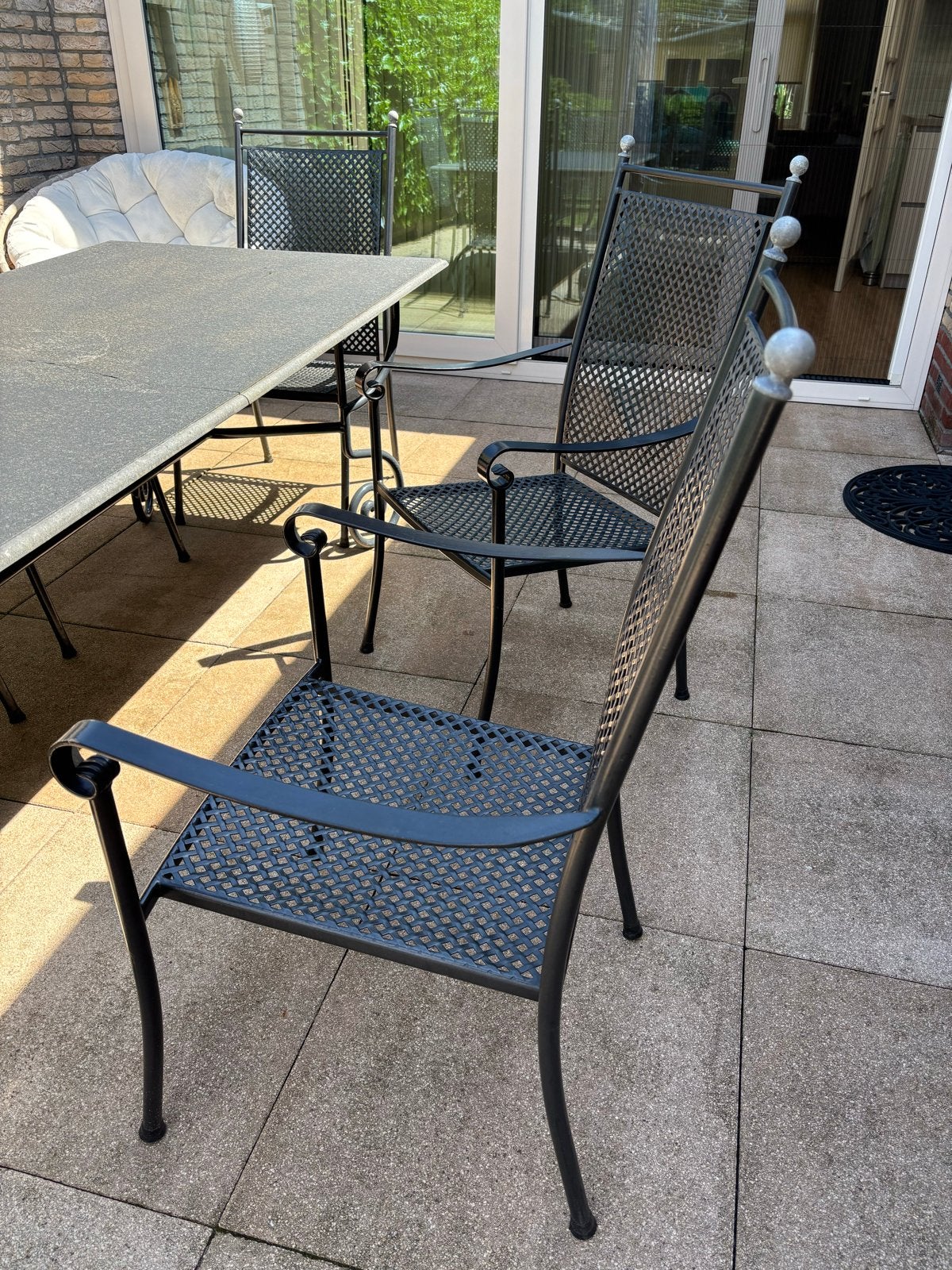 Tuinset met hardsteen blad en 6 gietijzeren stoelen, Ophalen, Overige materialen, Gebruikt, Eettafel
