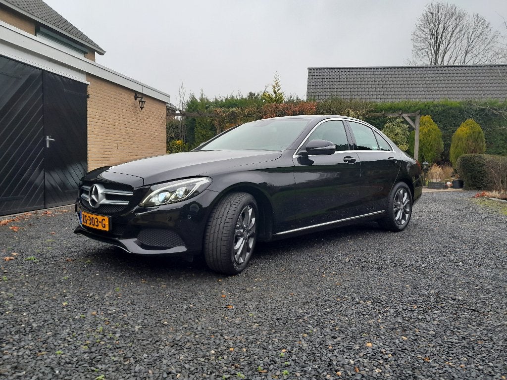 Mercedes-Benz C-Klasse C180 1.6 115KW Aut7 2016 Zwart, Automaat, 1800 kg, Zwart, Leder en Stof