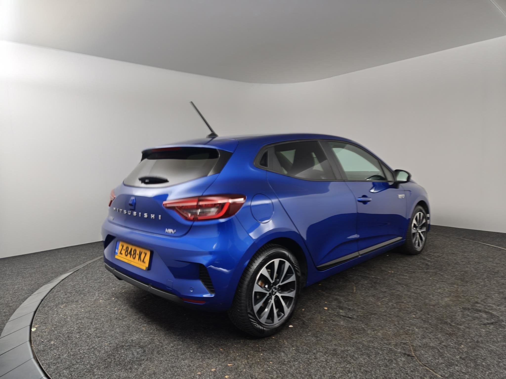 Mitsubishi Colt 1.6 HEV Intense | Achteruitrijcamera | Clima, Auto's, Mitsubishi, Stof, Gebruikt, Euro 6, Blauw