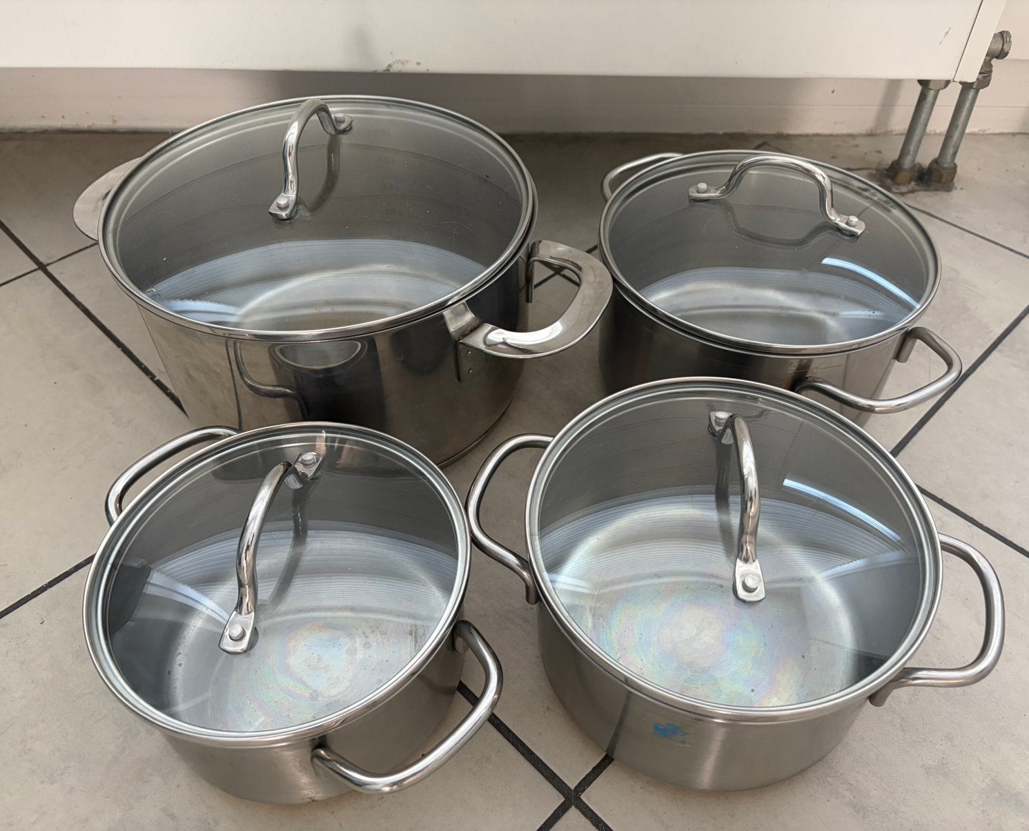 4 pannen met deksels, Gebruikt, Pannenset, Ophalen of Verzenden, Met handvatten
