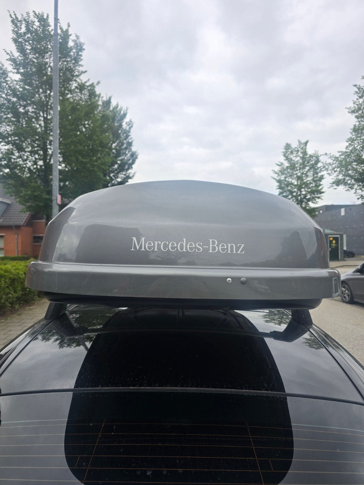 dakkoffer van orginal Mercedes-Benz, Ophalen