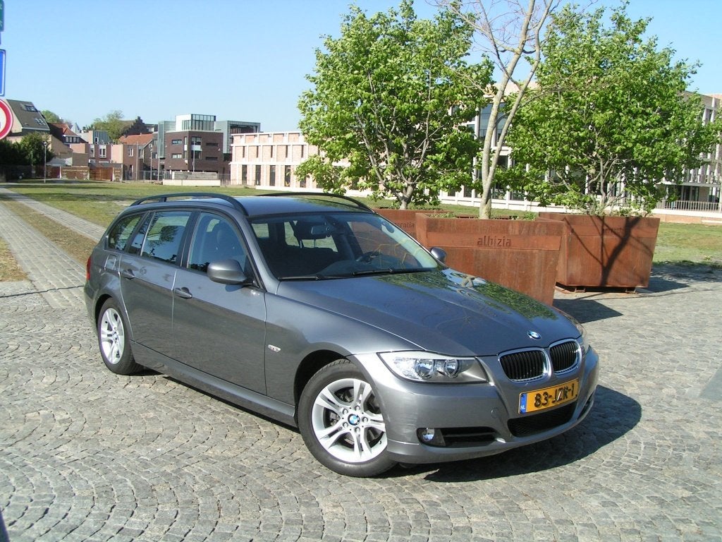 BMW 3-Serie 2.0 318 I Touring 105KW 2009 Blauw, Auto's, BMW, Origineel Nederlands, Handgeschakeld, Particulier, 1405 kg