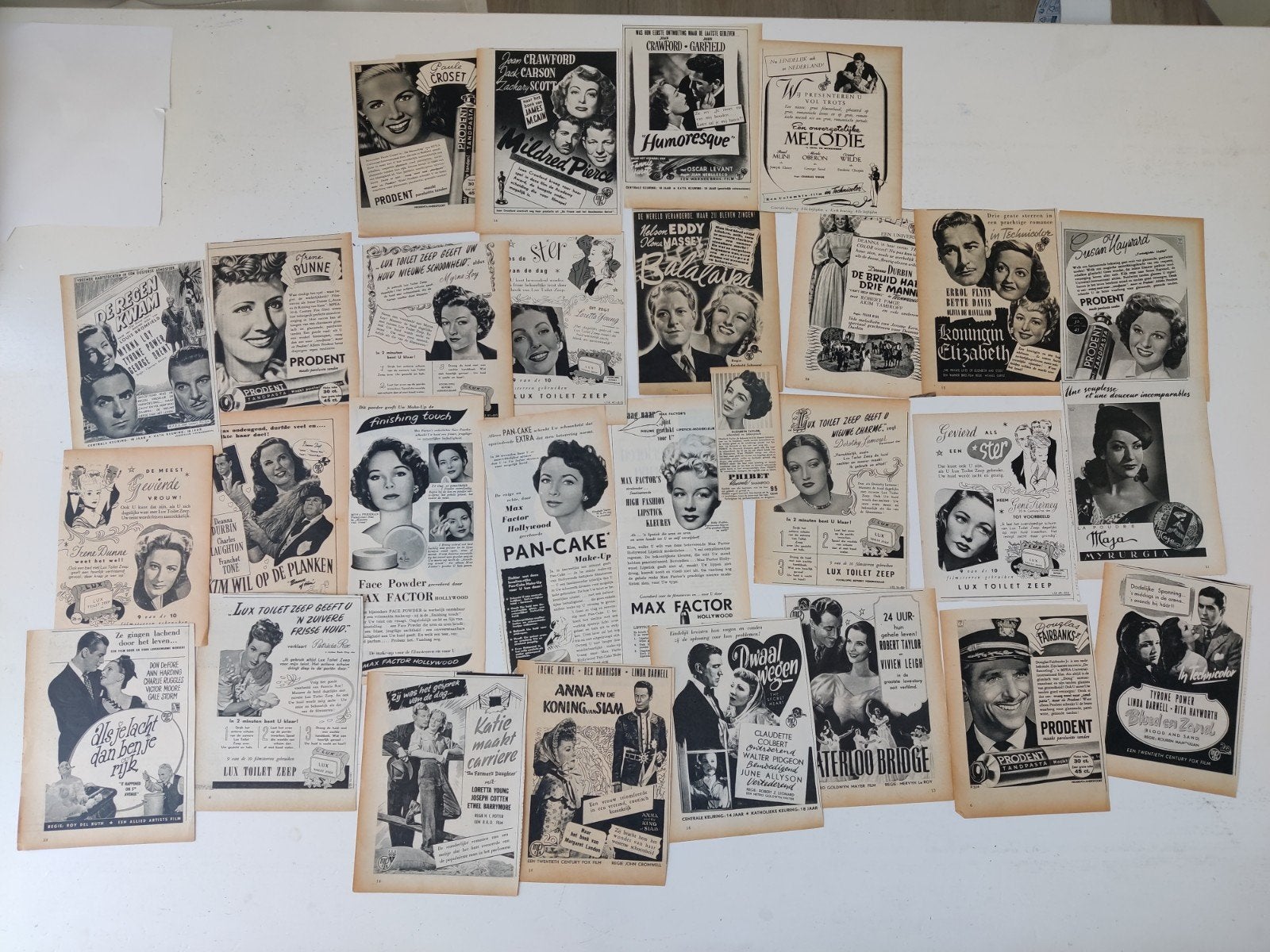 29 reklame knipsels met vintage filmsterren, Ophalen of Verzenden, Gebruikt, Foto of Kaart