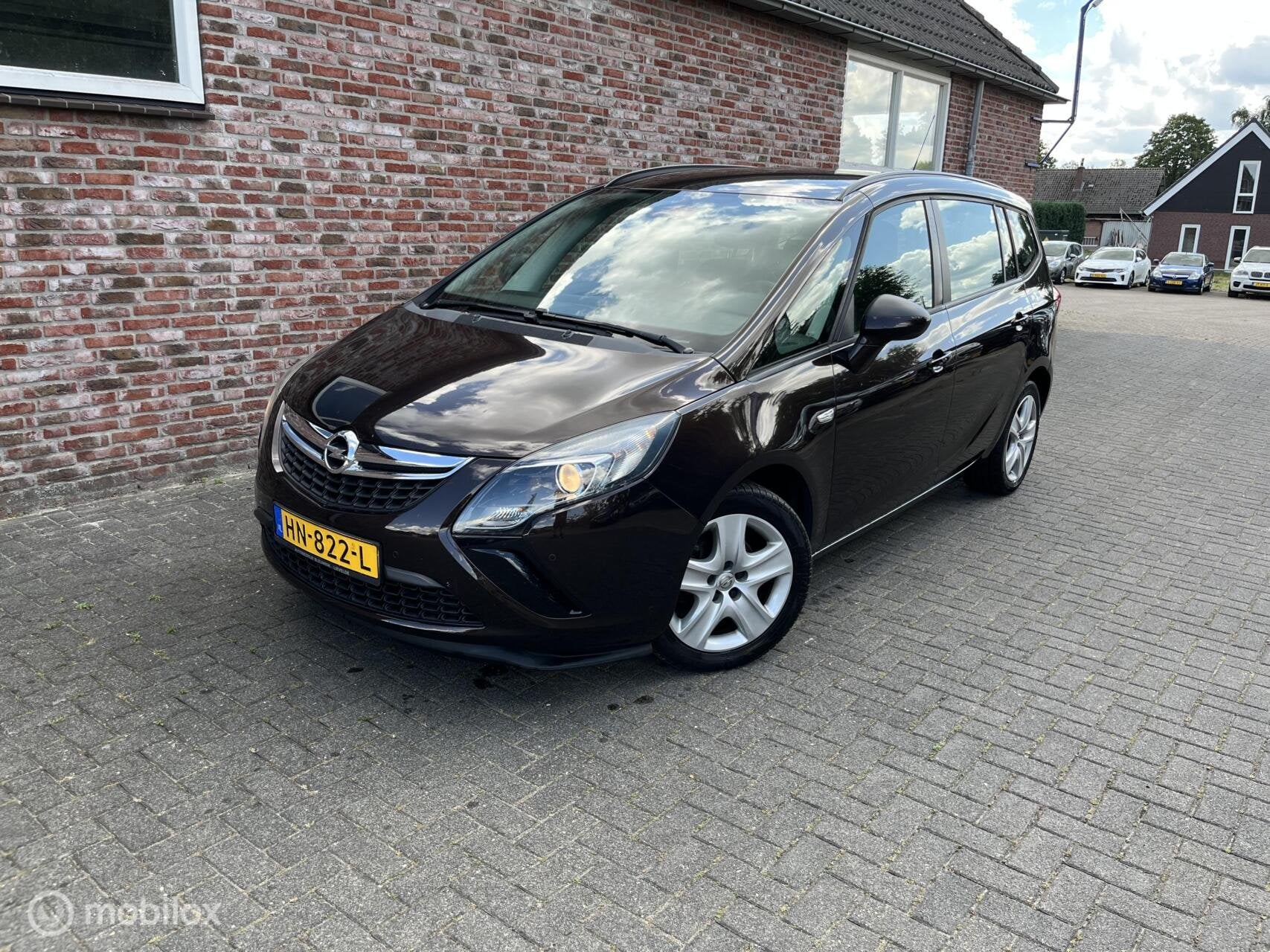 Opel Zafira Tourer 1.4 Cosmo, Auto's, Opel, Euro 5, 4 cilinders, Bruin, Bedrijf