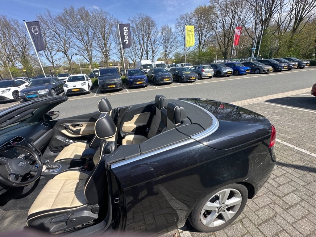 Volkswagen Eos 2.0 TSI Highline Automaat Leer 2 TONE, Auto's, Gebruikt, 4 cilinders, 4 stoelen, Zwart