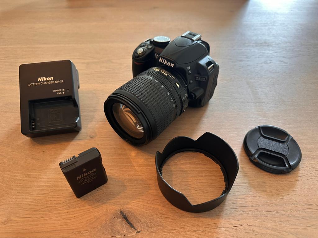 Nikon D3100 + Nikkor 18-105mm VR lens, Ophalen of Verzenden, Zo goed als nieuw