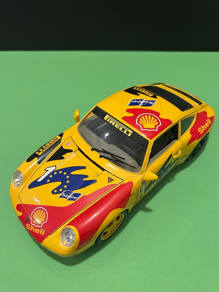 (#29). Modelauto 1:18 Gele Porsche 911 Carrera GT uit 1993, Ophalen of Verzenden, Gebruikt, Auto, Bburago