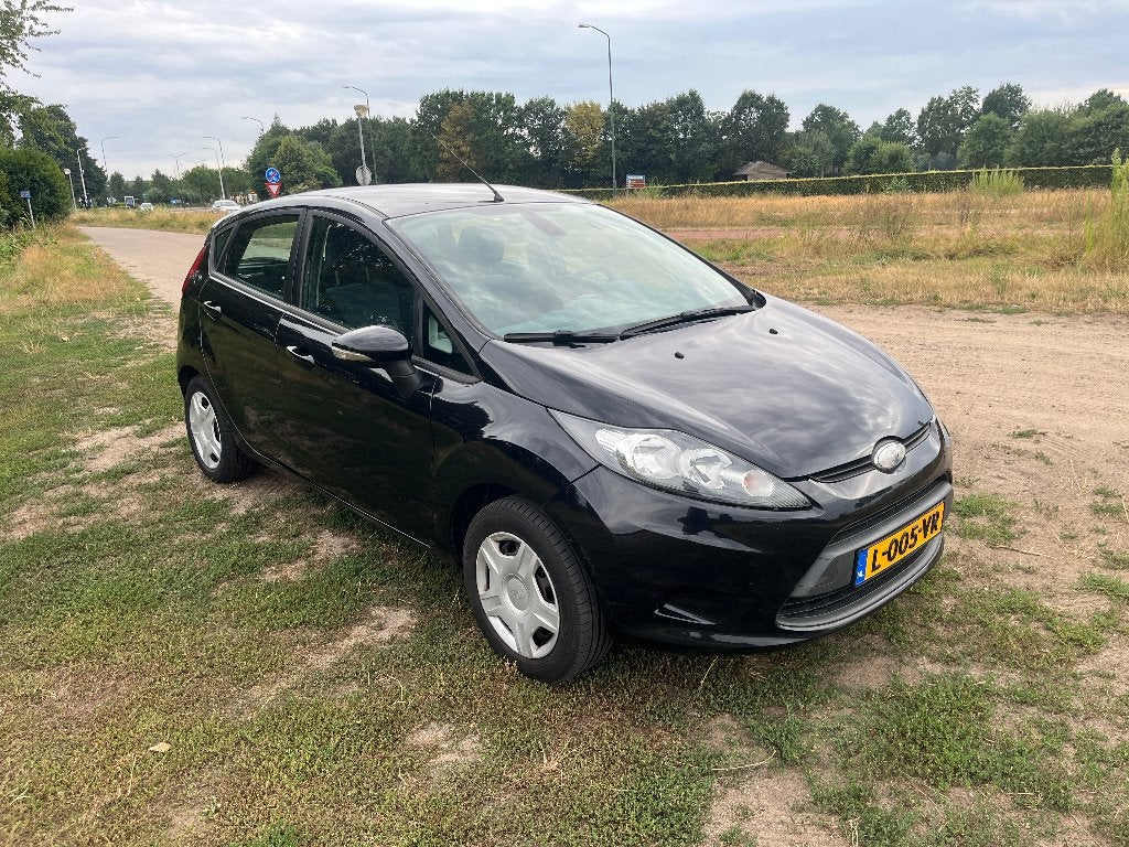 Ford Fiësta 1.25 60KW 5DR 2009 Zwart, Auto's, Voorwielaandrijving, Stof, 1242 cc, Zwart