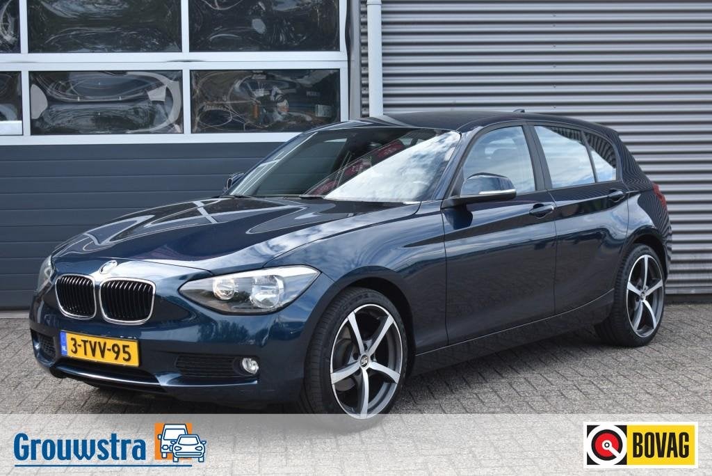 Bmw 1-SERIE 116I BUSINESS+ / 18 INCH / CLIMA / CRUISE, Euro 5, Gebruikt, 4 cilinders, Blauw