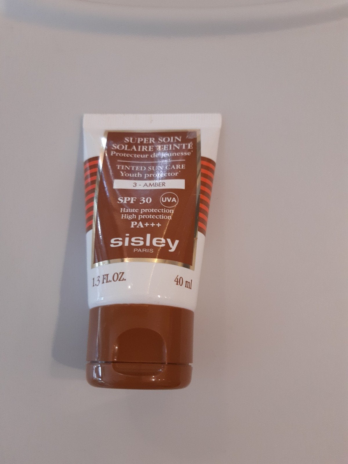 Sisley Super Soin Solaire Teinté SPF30 - 3 Amber, Sieraden, Tassen en Uiterlijk, Ophalen of Verzenden, Nieuw, Zonnebrand of After Sun